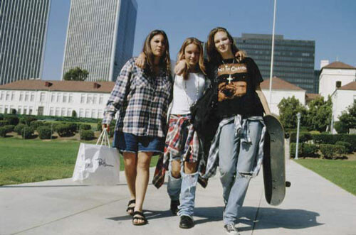 1990 grunge fashion style girls skateboard dirty photo ripped jeans rocker tee
